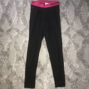 Black nike leggings with pink waist band